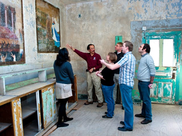 Visitors touring the murals (courtesy Eastern State Penitentiary)