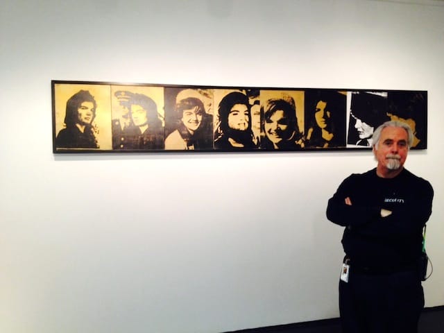 MCA security guard with Andy Warhol's "Jackie Frieze" (1964). All photographs by the author for Hyperallergic. 