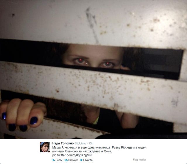 A photo tweeted by Nadezhda Tolokonnikova shows Maria Alekhina in a police van in Sochi. (photo by Nadezhda Tolokonnikova, via Twitter)