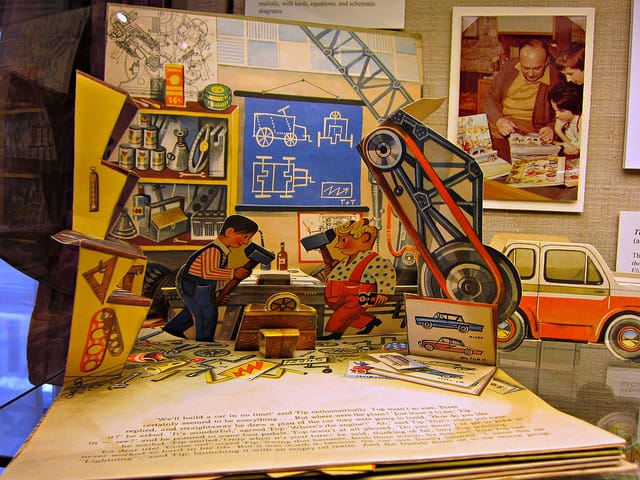 One of Kubasta's "Tip + Top" children's books, and a photograph of the artist