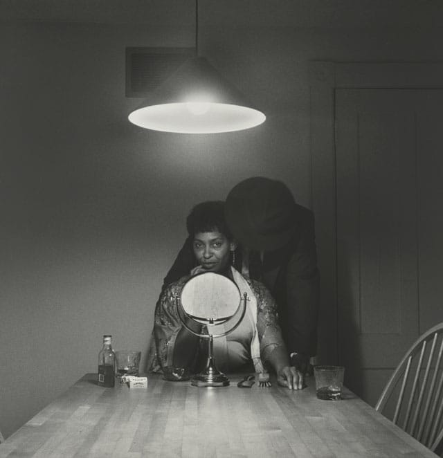 Carrie Mae Weems, "Untitled (Man and mirror)," from "Kitchen Table Series" (1990), gelatin silver print, 27 1/4 x 27 1/4 in (69.2 x 69.2 cm) (Collection of Eric and Liz Lefkofsky, promised gift to The Art Institute of Chicago) (© Carrie Mae Weems) (photo © The Art Institute of Chicago) (click to enlarge)