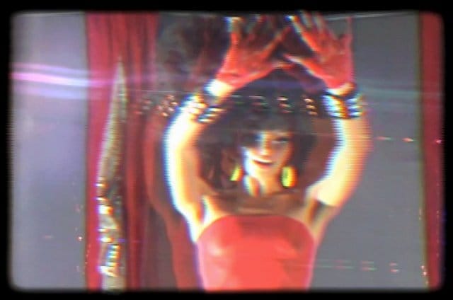 Narcissister, still from "Every Woman" (2010) (via dailyserving.com) (click to enlarge)