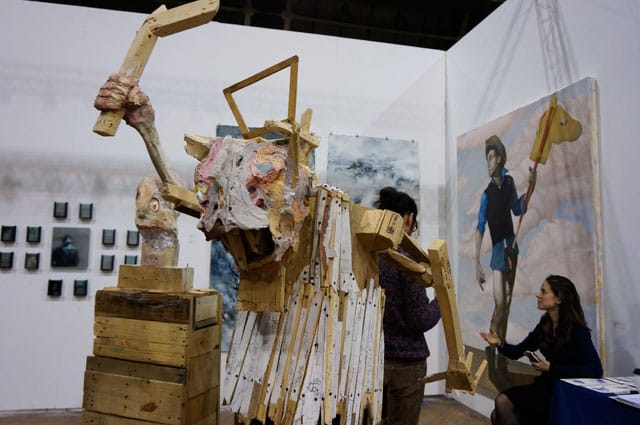 Close-up of Nicolas Holiber's "Preacher Man" (2013), with Cory Dixon's "The Heroes Journey: Scene 1" (2014) in back right