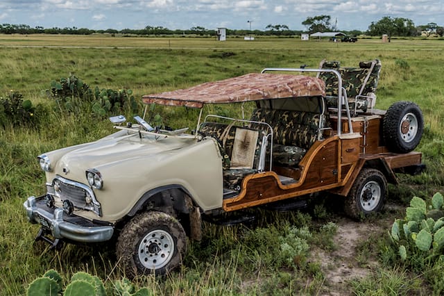 Tio,Kleberg,Santa Gertrudis Division of the King Ranch,1958,Checker,Yellow Cab,Joaquin Arredondo and Pedro Castañeda,"Car war built using a checker cab, instead scabbards were hand molded by Joaquin Arredondo at King Ranch. Under carriage today is an 7250- 4x4- all cabinet work, by Grey Coleman of Kingsville - 3 full pull drawers on left side with a picnic table bellow high seat, top and wind shield folds down.",