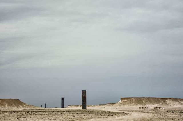 Richard Serra, "East-West/West-East" in the Qatar desert (via Qatar Museums Authority)