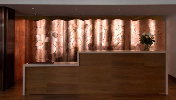 Glaser's copper cloud wall inside the Rubin Museum of Art (via miltonglaser.com)