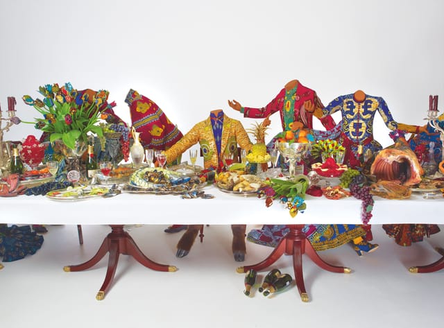 Last Supper (after Leonardo), 2013 pp. 70-71 Thirteen life-size mannequins, Dutch wax printed cotton, reproduction wood table and chairs, silver cutlery and vases, antique and reproduction glassware and tableware, fiberglass and resin food 158 x 742 x 260 cm VandenBroek Foundation, Sassenheim Courtesy the artist; Stephen Friedman Gallery, London; and James Cohan Gallery, New York/Shanghai Photograph courtesy Stephen White 