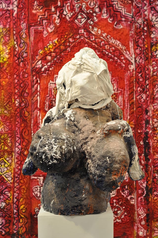 Summer Wheat's "Gentlemen's Muse" (2014) in front of her "Warm Tapestry" (2014) at the Samson gallery booth. (all images by the author for Hyperallergic)