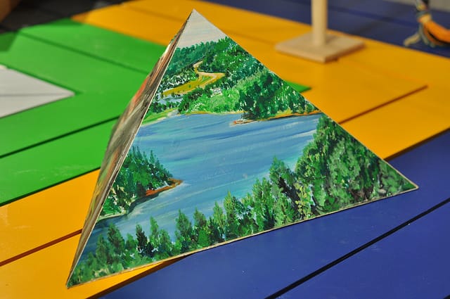 One of faces of Andy Cross's "Pyramid Painting" (2014), which is 13 in. high.