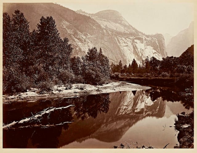 Carleton Watkins (U.S.A., 1829–1916), Mirror View of the North  Dome, Yosemite, 1865–1866, from the album Photographs of the Yosemite  Valley. Albumen print. Lent by Department of Special Collections,  Stanford University Libraries.