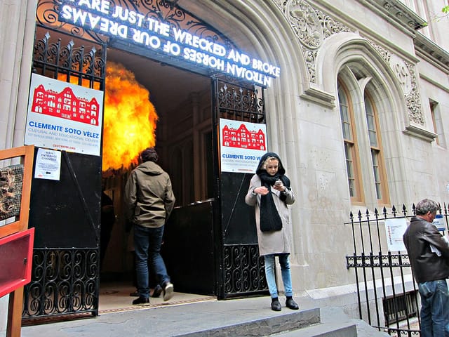 Work by Robert Montgomery over the entrance to Cutlog, with a sculpture by Shoplifter just inside