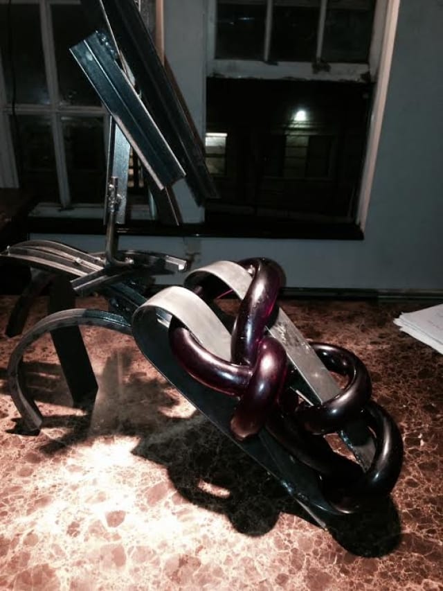 Jo Nigoghossian, "Steel and rubber crawler, purple" (2014)