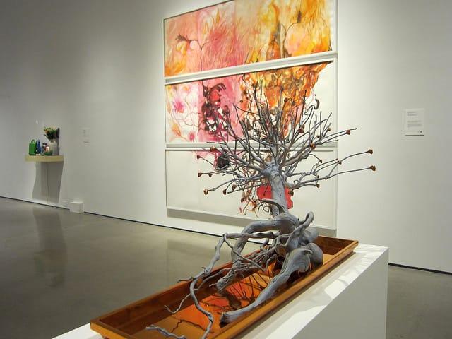 Rona Pondick, "Dwarfed Blue Pine" (2009-10), painted bronze & Maria Magdalena Campos-Pons, "The One That Carries Fire" (2011)