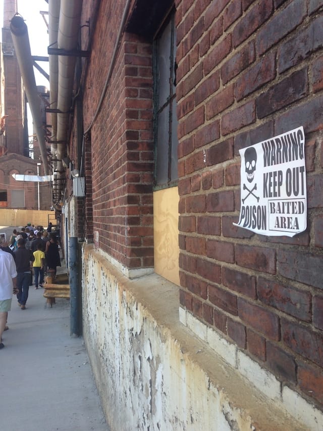 A sign warns visitors of the presence of poison