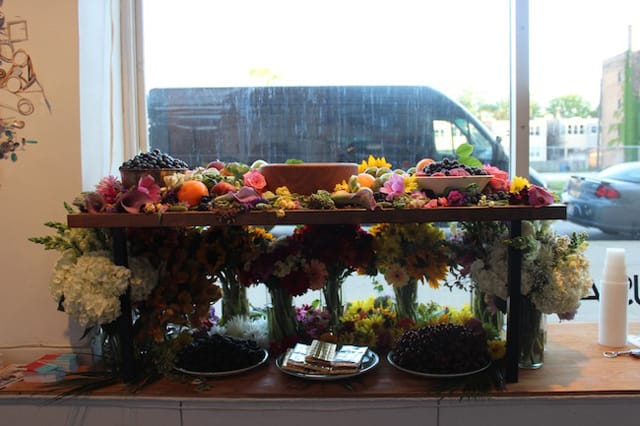 The initial display of flowers and food that Kent salvaged from local grocery stores