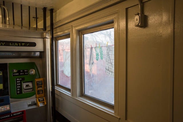 Laura F. Gibellini, "Dom (Variations)" (2013), laminated glass in the Forest Avenue station