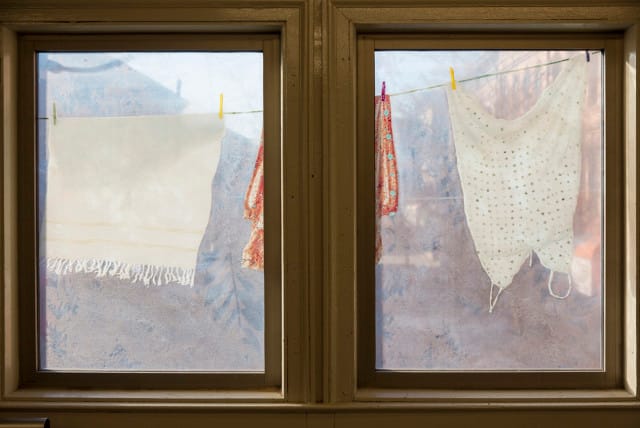 Laura F. Gibellini, "Dom (Variations)" (2013), laminated glass in the Seneca Avenue station