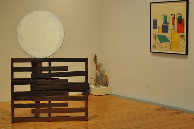 Chris Johanson's "Restorative Moon Sculpture #1" (2001) dominates one corner of the exhibition.