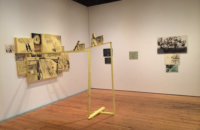 Chris Johanson's "The Survivalists" (1999) with drawing by Johanson and Alicia McCarthy in the background.