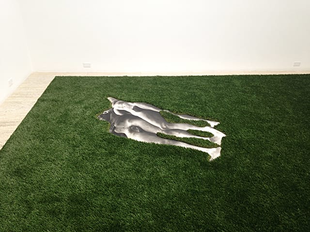 Ellen Brooks, "Untitled (Lawn Couple)" (1970), silver print on photo linen, shaped Astro Turf, dimensions variable