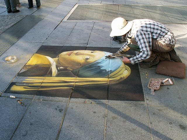 Creating a chalk version of Vermeer's "Girl with the Pearl Earring" in Paris. The painting is now no longer allowed to leave the Hague. (photograph by manannan_alias_fanch, via Flickr)