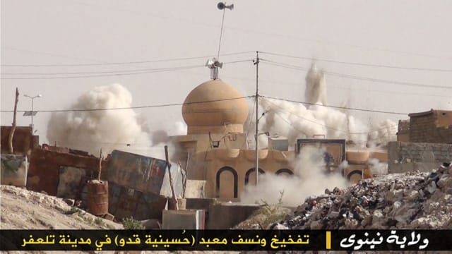 Destruction of an Islamic religious site by ISIS (Twitter via Al-Arabiya)