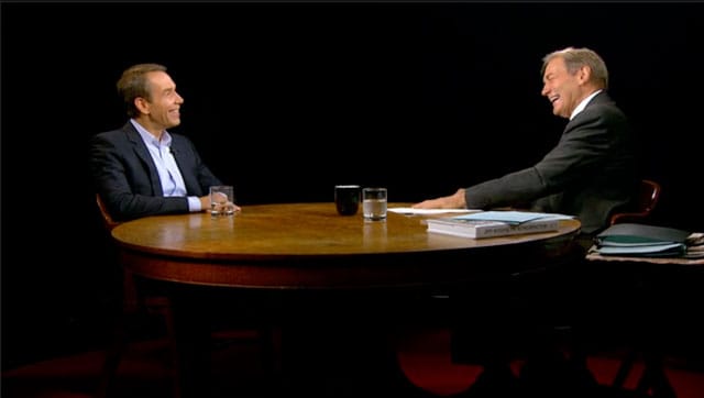 Jeff Koons and Charlie Rose (screenshot via Hulu)