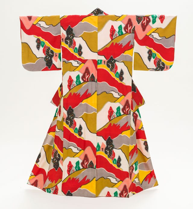 Woman’s Kimono with Mountain Landscape (Japan, mid-Shōwa period, c. 1950), silk plain weave, stencil-printed warp and weft (heiyō-gasuri meisen), purchased with funds provided by Jacqueline Avant