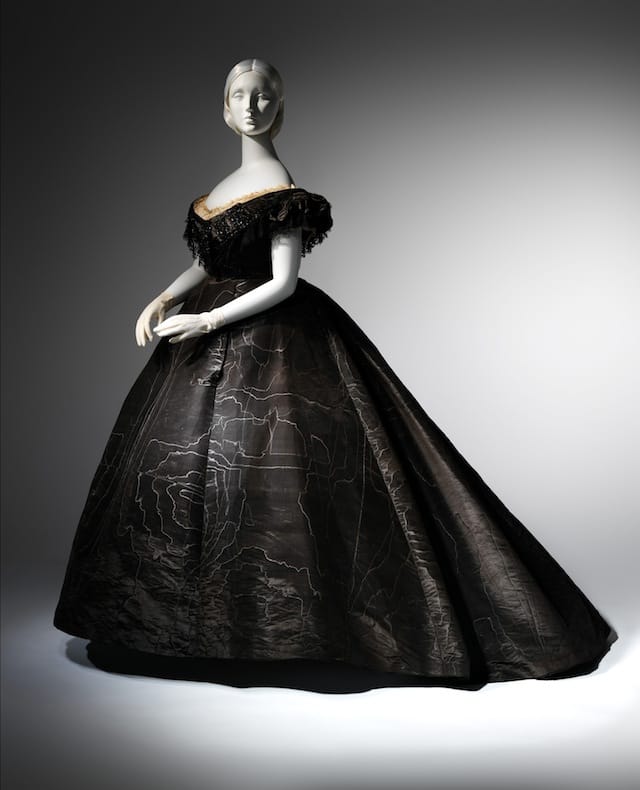 Evening Dress, ca. 1861 Black moiré silk, black jet, black lace Lent by Roy Langford (C.I.L.37.1a) Photo: © The Metropolitan Museum of Art, by Karin Willis