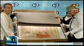 Venezuelan authorities showing off the returned Matisse on Monday (screenshot via YouTube)