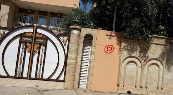 A Christian home in northern Iraq marked with ن  (via National Review)