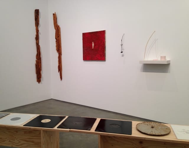 Installation view, 'Another Look at Detroit' at Marianne Boesky Gallery, with Gordon Newton's "Untitled Pair" (1972) in corner and Metroplex records in foreground