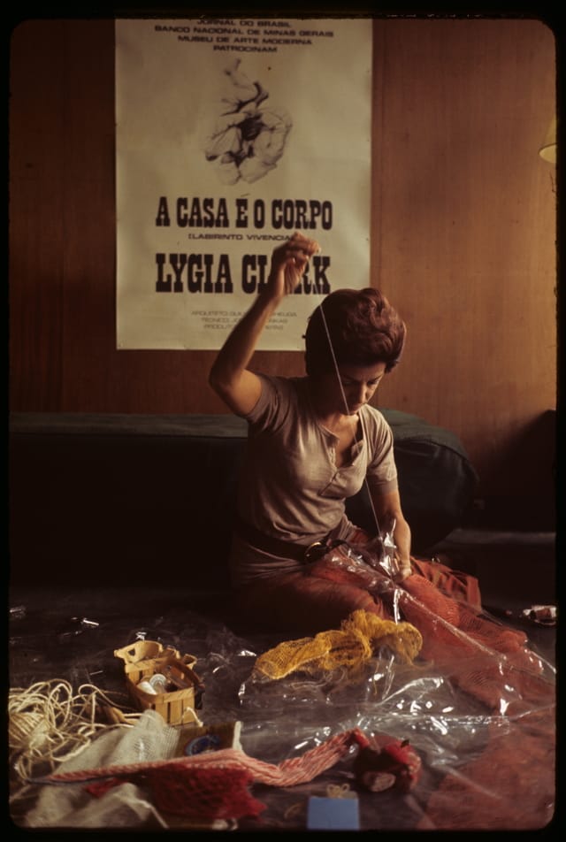 Lygia Clark in her studio working on "Arquitetura biológica II" (Biologic architecture II), Cité internationale des arts, Paris, 1969 (photo by Alécio de Andrade, courtesy Associação Cultural “O Mundo de Lygia Clark,” Rio de Janeiro)