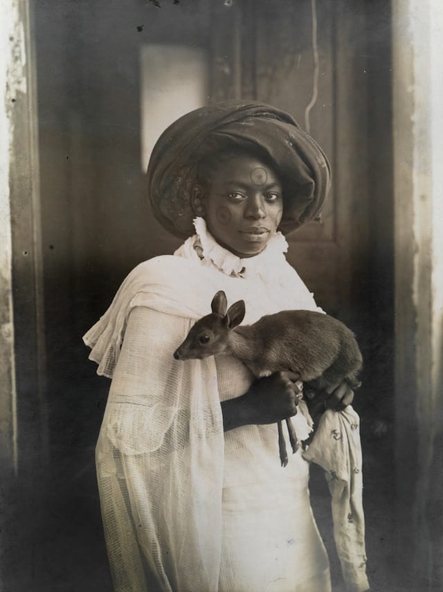 A Kenyan woman with her pet deer in Mombassa (March 1909) (photograph by Underwood & Underwood)