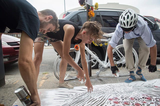 Painting memorial for Asif Rahman, including artist Robyn Renee Hasty at center (photograph by Rabi Abonour, courtesy Right of Way)