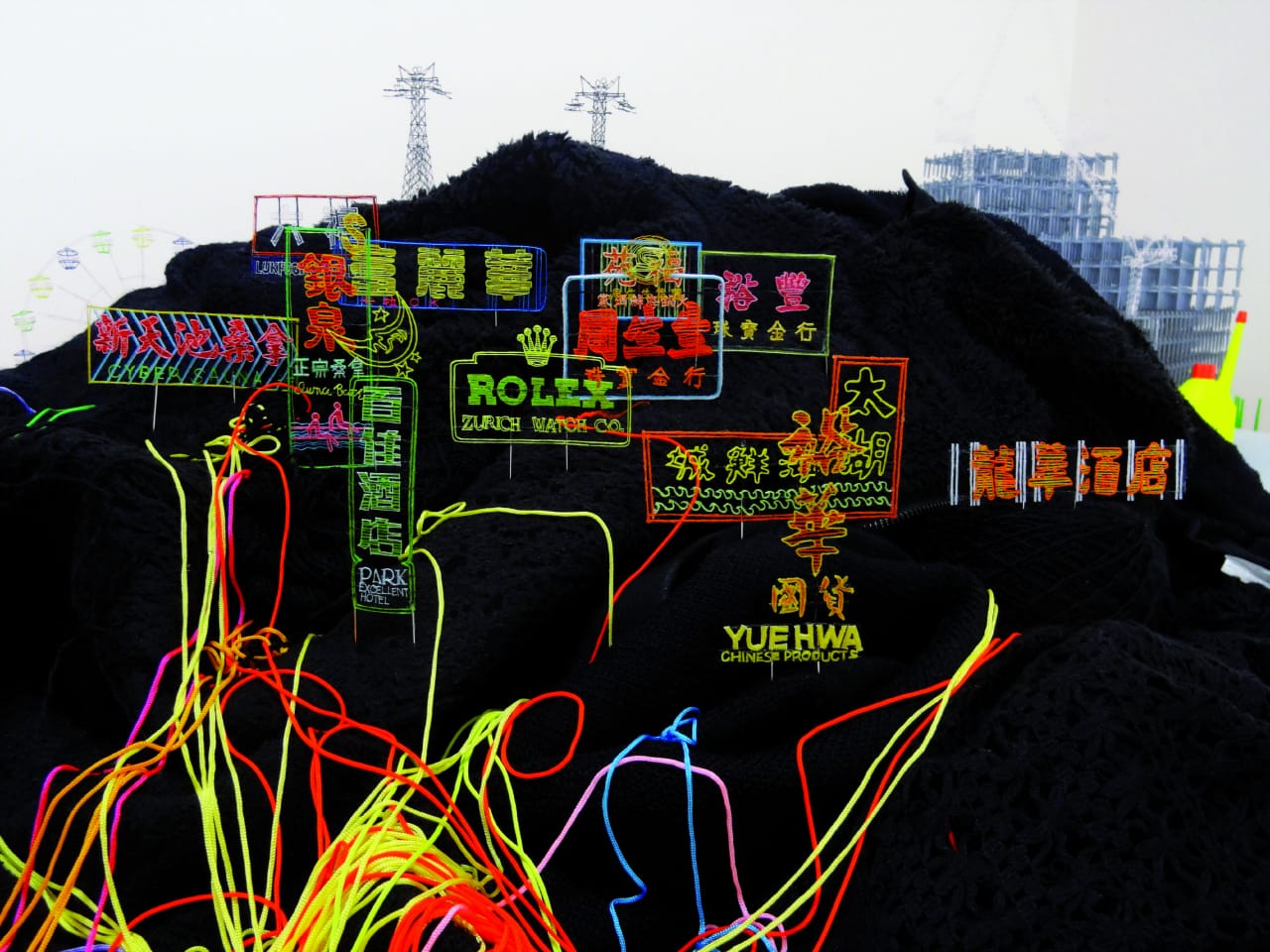 Takahiro Iwasaki, Out of Disorder (Neonscape), 2013. Clothes, Lily yarn. Dimensions variable.  Image credit: Courtesy of the artist and Arataniurano, Tokyo