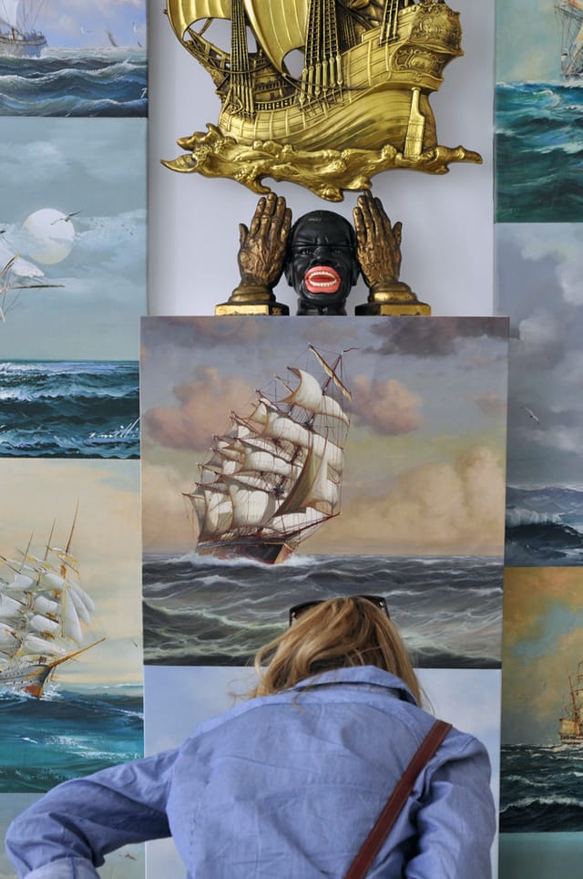 Someone examining Nick Cave's “Sea Sick” (2014) when it was on view at Jack Shainman's The School this past spring (click to enlarge)