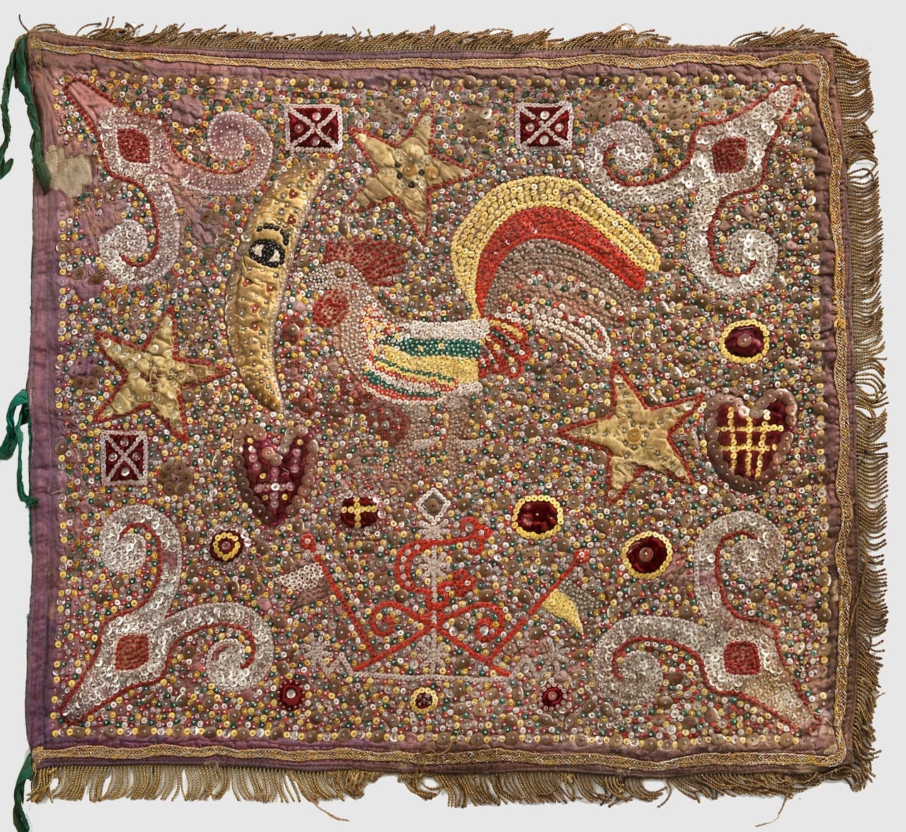 Ogou Balendjo, mid 20th century, satin, cotton, velvet trapunto, sequins, beads, thread, and fringe, 28 x 24 x 3/8 inches, private collection. Photo: EG Schempf