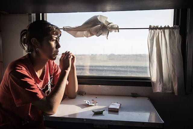 A 20-year-old girl rides the Bishkek-Moscow train to Russia for work one week after her marriage. (All images courtesy of )