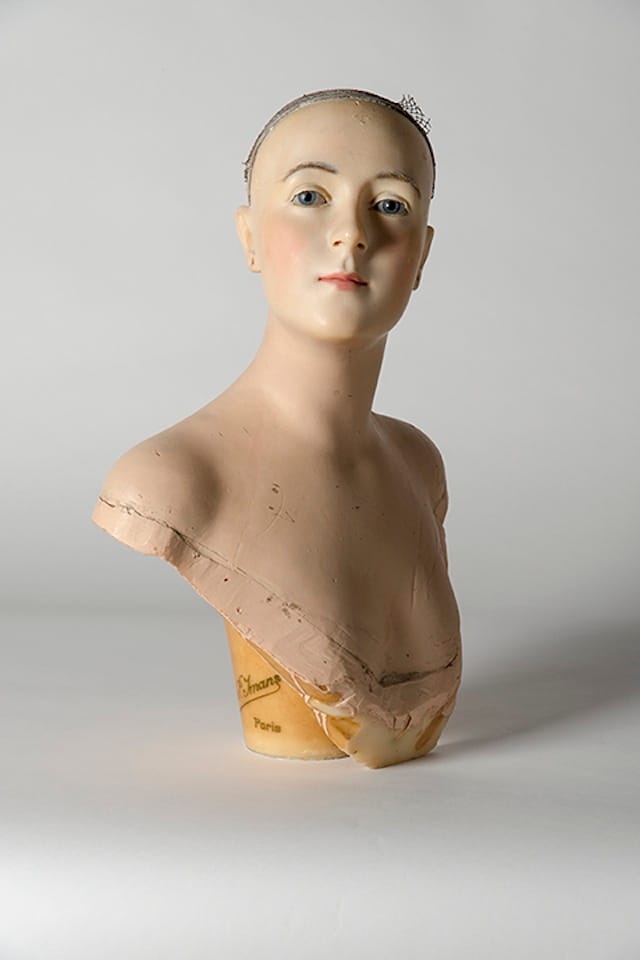 Wax bust by Pierre Imans, 1910s–20s A self-described “sculptor and ceroplastician,” the Dutch mannequin maker Pierre Imans owned one of the two leading French mannequin companies in the early 20th century. With their enamel eyes and human hair, his wax figures were incredibly realistic — so much so that Imans frowned on the word ‘mannequin’, preferring them to be described as Les Cires de Pierre Imans (The Waxes of Pierre Imans).   (image courtesy of the Fashion Museum, Bath © Fashion Museum, Bath and North East Somerset Council )