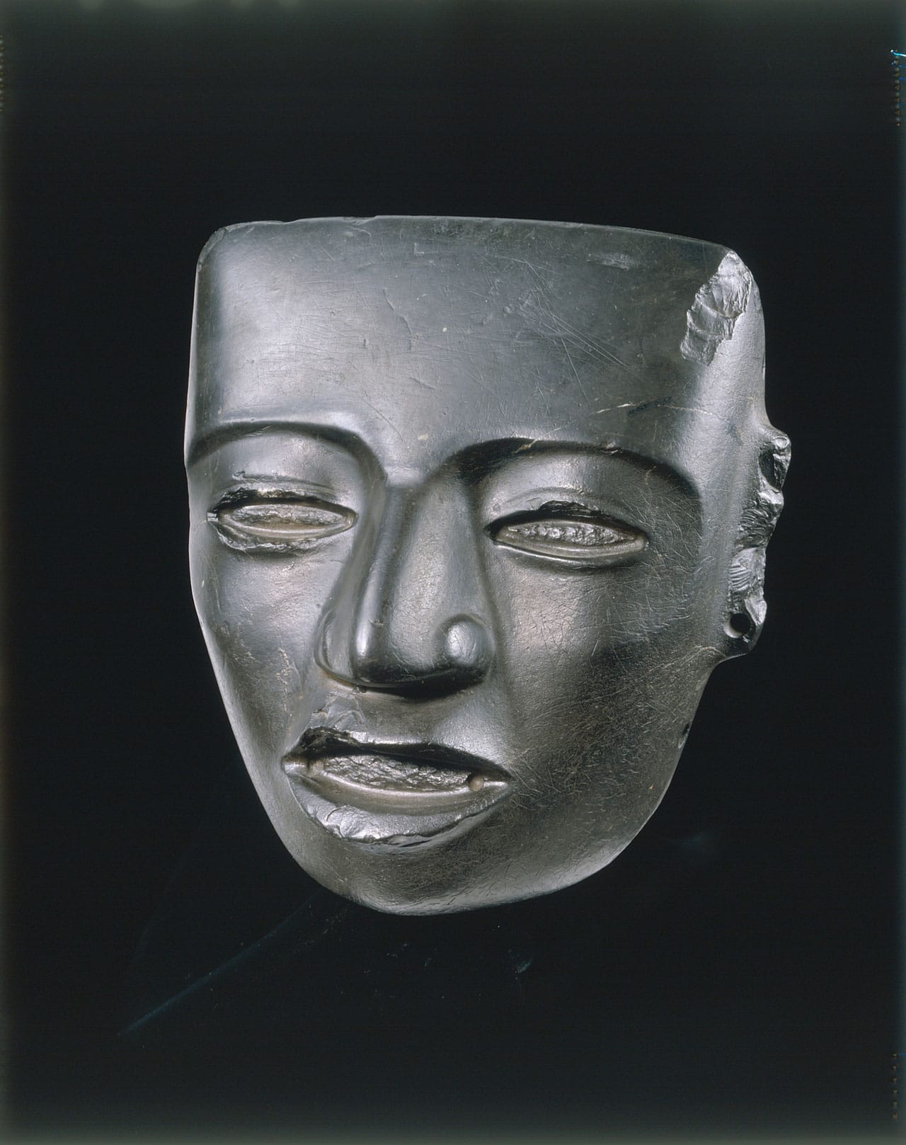 Mask, Mexico, Basin of Mexico (150–550 CE), black stone, 20 x 18 x 12 cm, Musée du quai Branly, Paris (© musée du quai Branly, photo Hughes Dubois)