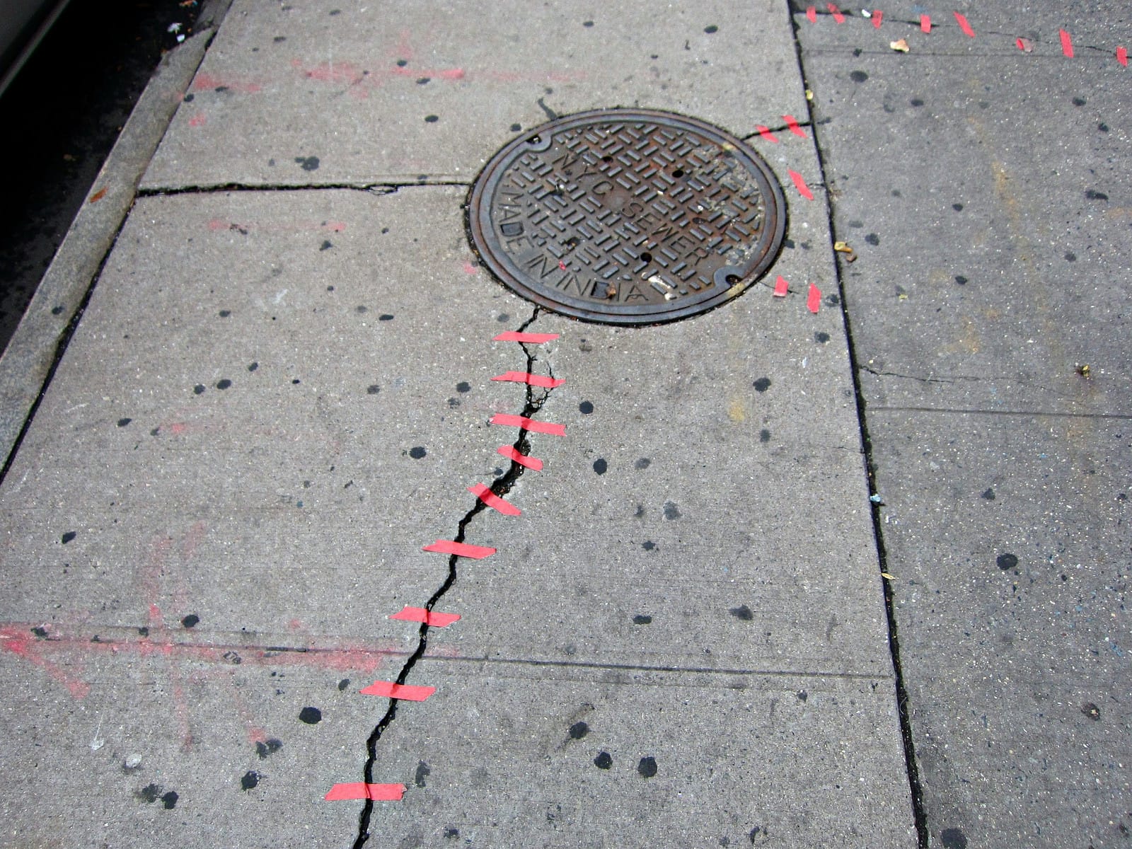 Kara Schmidt, "Defracturing," where sidewalk cracks were "repaired" with tape