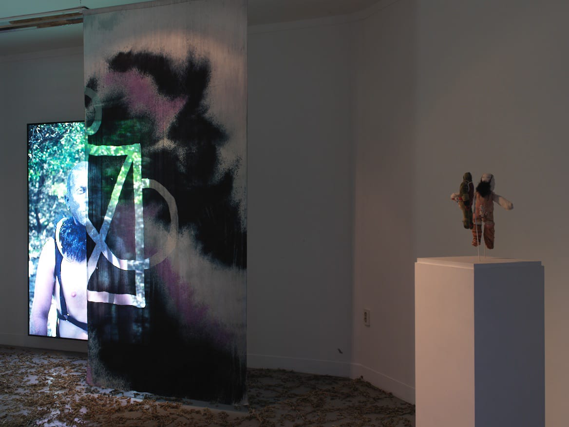 Works intermingle in confusing ways. From left to right, “Black” by Ryan Brewer and AA Bronson (2011), “Flesh of Our Flesh” (2014) by AA Bronson and Richard John Jones, and “Voodoo Dolls (AA Bronson and Mark Jan Krayenhoff van de Leur)” (2013) by Reima Hirvonen.