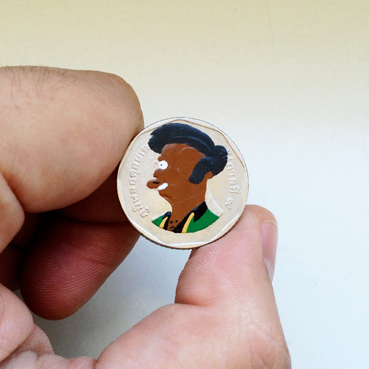 Andre Levy coin painting of Apu Nahasapeemapetilon