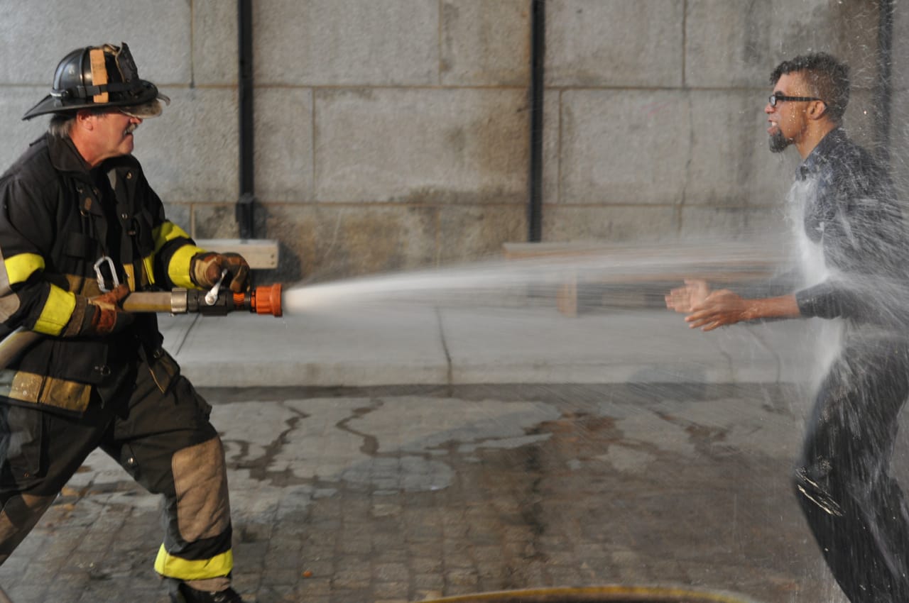 Dread Scott performing …&nbsp;under the Manhattan Bridge (all photos by the author for Hyperallergic)