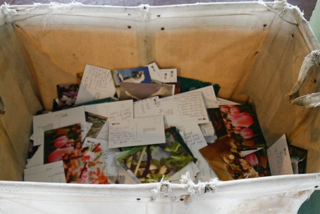 Visitor letters ready to send to political prisoners around the world, "Yours Truly" (2014)