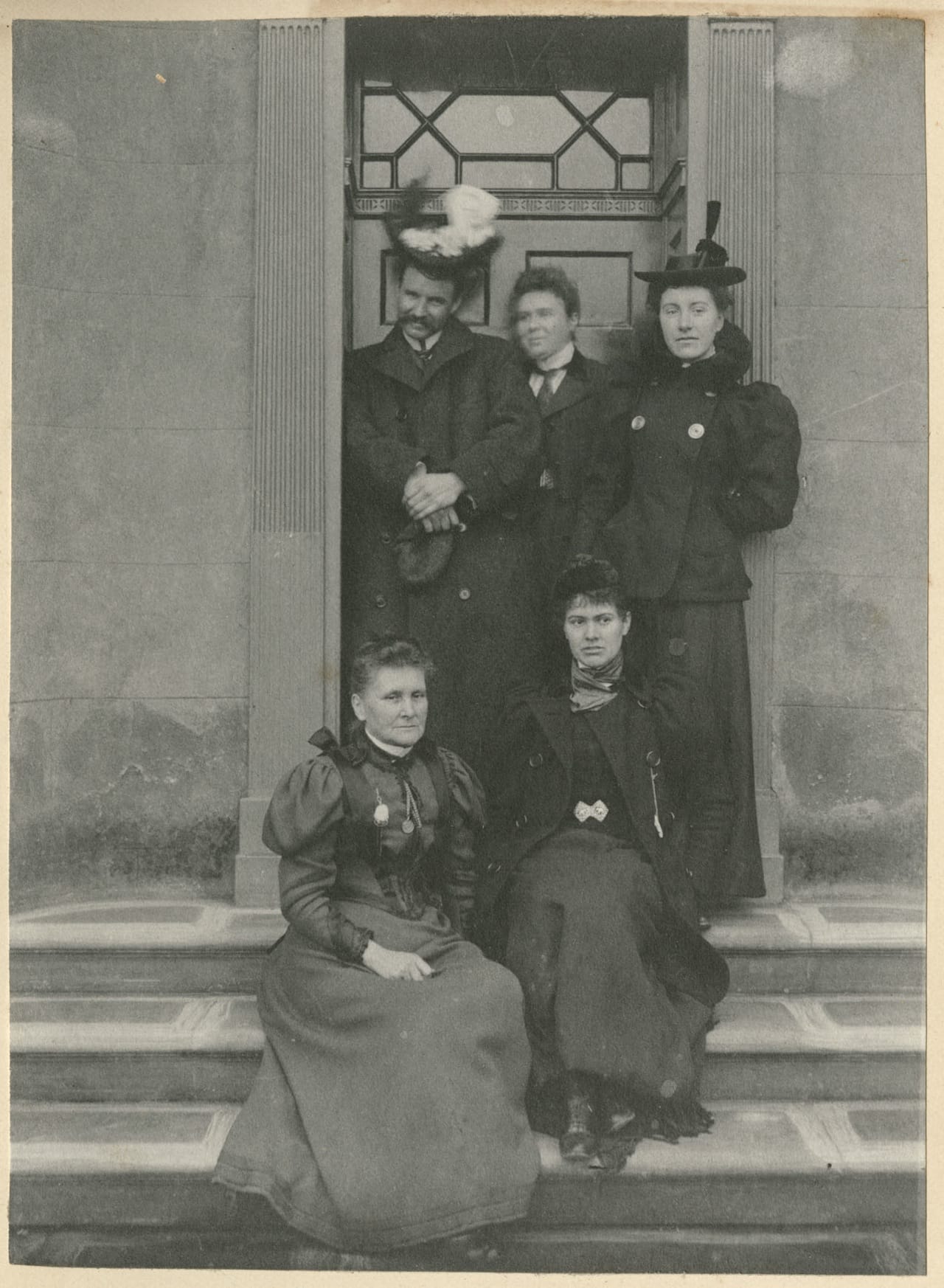 A hatted group on steps (all photographs courtesy Woodhorn Museum and Northumberland Archives)