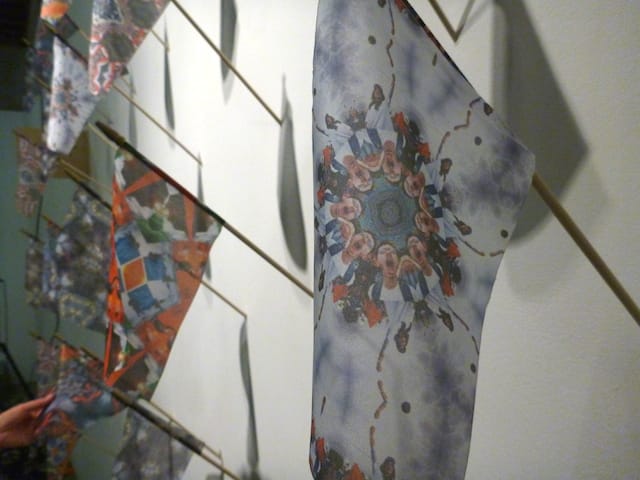 A detail of Sanaz Mazinani's Conference of the Birds (Flags), blending images from the Occupy Movement and the Arab Spring.