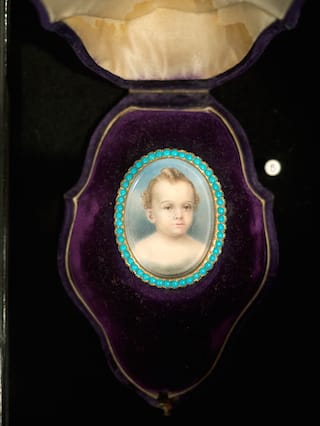 Cased brooch with painted child’s portrait, probably postmortem, with turquoise surround, collection of Jennifer Berman