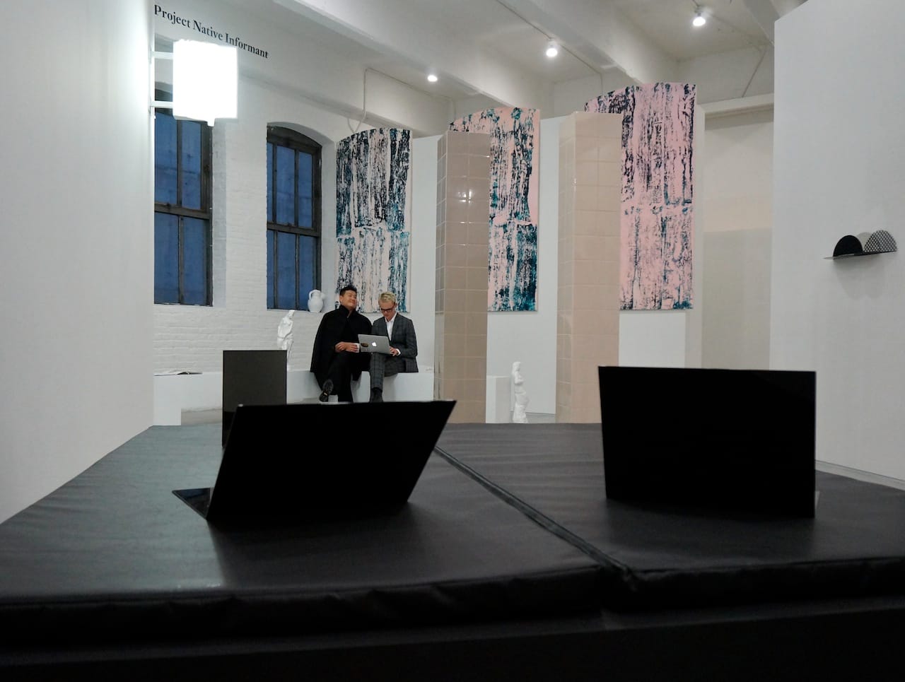 Work by Prem Sahib, at Gallerie Lorcan O'Neill and Southard Reid's shared booth, in the foreground, and Emanuel Röhss at Project Narrative Informant in the background